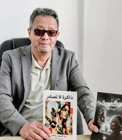 Signature de la nouvelle œuvre "Mémoire inaliénable" de Abdelmajid Taam au Salon maghrébin du livre d'Oujda
